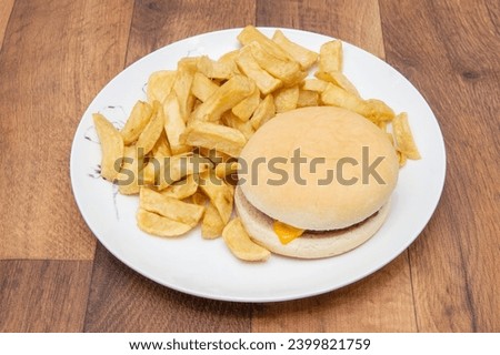 Chip Shop Food, deep fried food, battered food, fish and chips, black pudding, white pudding, burgers and chips, pies, chips, fish chips and peas Royalty-Free Stock Photo #2399821759