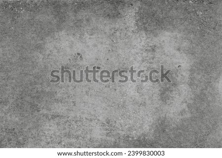 Grey old surface rough solid wall texture cement concrete background pattern structure backdrop.
