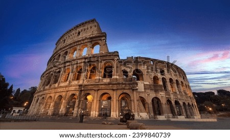 The Flavian Amphitheatre, more commonly known as the Colosseum, stands in the archaeological heart of Rome, Italy Royalty-Free Stock Photo #2399840739