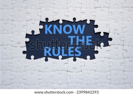 Know the rules symbol. Concept words Know the rules on white puzzle. Beautiful deep blue background. Business and Know the rules concept. Copy space.