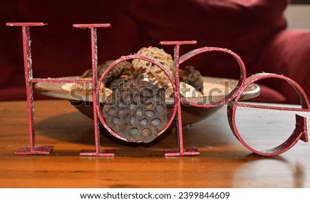 Red hope sign on a wooden table