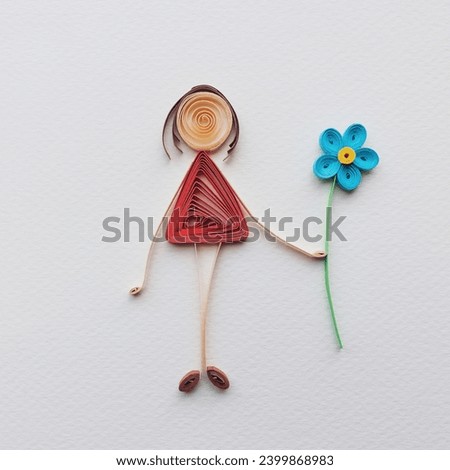 Simple colorful stick figure girl giving flower, love, Mother's Day, boy with blue shirt make in quilling art isolated on white background. Hand made of paper quilling technique. handicraft at home.