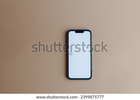 Smartphone mockup iPhone with white screen in a white background on high-quality studio shot