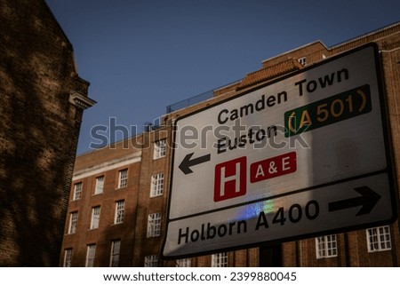 Follow the sign to Camden on a winter day in London. The image invites you on a journey through the city's streets, promising the vibrant and eclectic atmosphere of Camden.