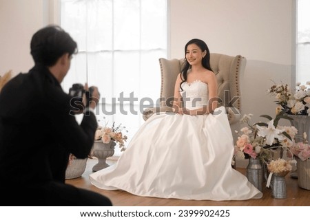 Groom taking pictures of beautiful bride for wedding ceremony, Love ,Romantic and wedding proposal concept.