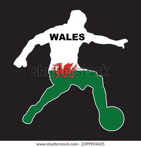 Silhouette of a Welsh footballer with national flag set in a black background