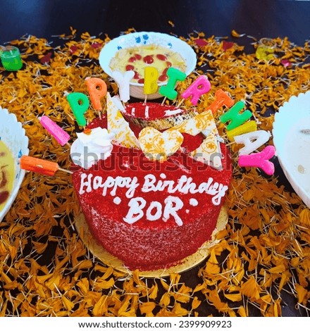 Birthday cake for my hubby. Red velvet cake.with flower. Royalty-Free Stock Photo #2399909923