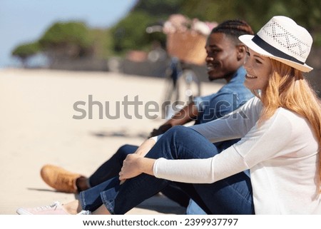 happy lovers on the beach Royalty-Free Stock Photo #2399937797