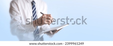 Close up businessman with pen signing contract document making a deal. Focus in hands with pen business concept on bright blur background Royalty-Free Stock Photo #2399961249