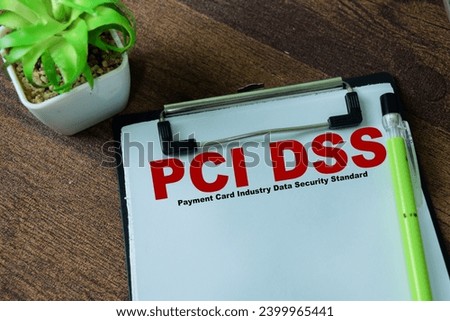 Concept of PCI DSS - Payment Card Industry Data Security Standard write on paperwork isolated on white background.
