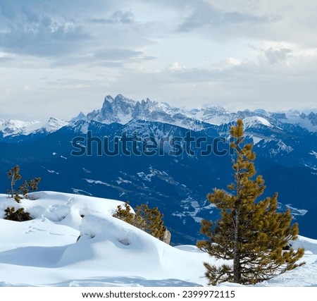 Beautiful winter mountain landscape. View from Rittner Horn (Italy) on  Puez Geislergruppe Royalty-Free Stock Photo #2399972115