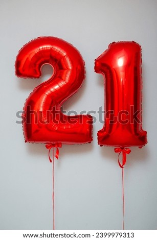 set of red balloons - numbers and a bunch of latex balloons with helium