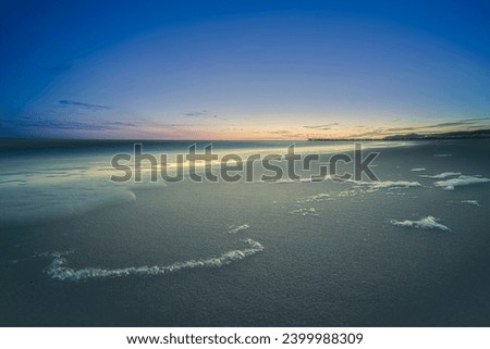 Beautiful seascape sunset on the sea. Composition of nature at the sand beach