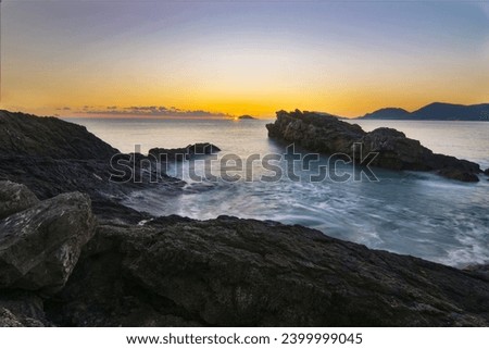 sunset over the sea with cliff
