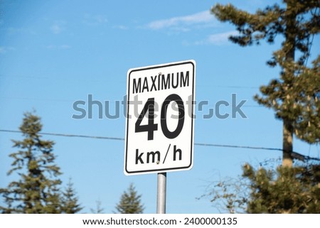 “Maximum 40km h” road sign on the street, in the residencial area.