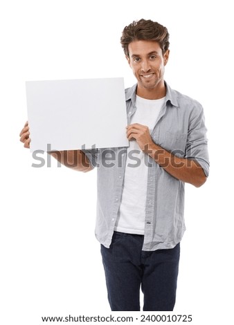 Portrait, advertising and man on poster, smile and mockup space isolated on a white studio background. Happy person show paper banner, sales promotion and blank placard presentation, sign and info