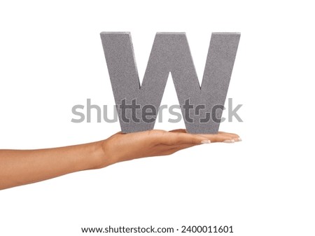 Woman, hand and letter w or alphabet in studio for advertising, learning or teaching on mock up. Sign, font or character for marketing, text or communication and grammar or symbol on white background