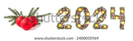 Red christmas ball and 2024 number made by christmas tree branches isolated on white background
