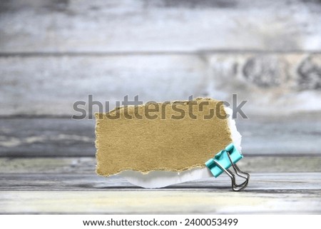 Empty paper for text or message short word letter on wood pantern background.Copy space.