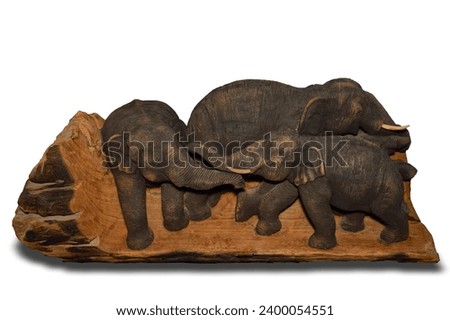 carved wooden elephant isolated on white