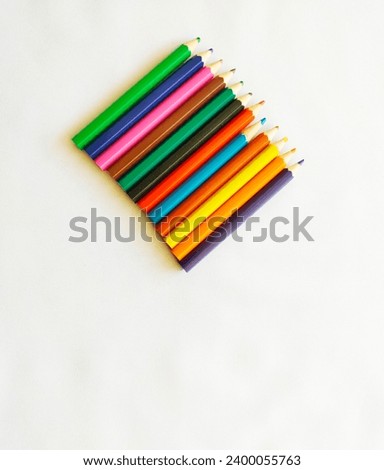 Various colour pencils isolated on white background.