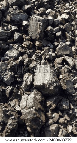 Coal mining : coal miner. Close up picture of coal background. Picture idea about coal mining or energy source, environment protection. Industrial coals. Volcanic rock. 

