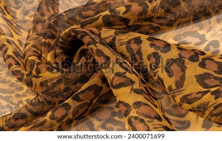silk fabric, leopard skin, brown-yellow black tones, hot African safari for your projects, texture background, pattern