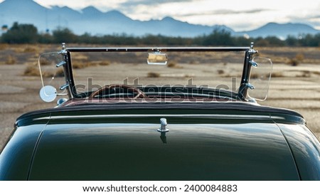 Rear of a green car Royalty-Free Stock Photo #2400084883