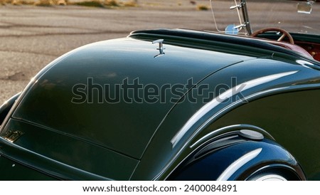 Rumble seat viewed from the side Royalty-Free Stock Photo #2400084891