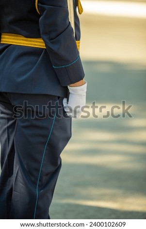 Military pilots at the parade, officers. Russian Air Force Day. Royalty-Free Stock Photo #2400102609