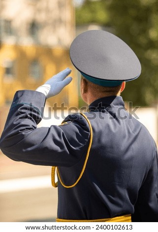 Military pilots at the parade, officers. Russian Air Force Day. Royalty-Free Stock Photo #2400102613
