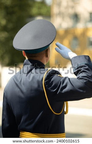 Military pilots at the parade, officers. Russian Air Force Day. Royalty-Free Stock Photo #2400102615