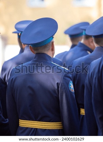 Military pilots at the parade, officers. Russian Air Force Day. Royalty-Free Stock Photo #2400102629