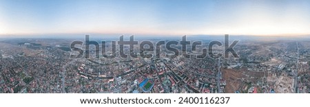 Grozny, Russia. Panorama of the city from the air after sunset. Blue hour. Panorama 360. Aerial view Royalty-Free Stock Photo #2400116237