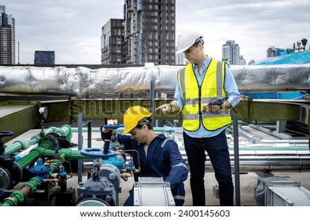 Industrial engineer work on site. engineer visit and inspection site engineer at industrial site. Inspector engineer check and working on site Royalty-Free Stock Photo #2400145603