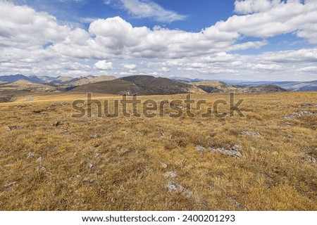 Rugged landscape around the Tundra Communities Trail, a beautiful example of the alpine tundra ecosystem in the Rocky Mountains Royalty-Free Stock Photo #2400201293