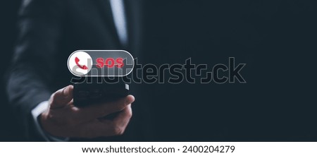 man using Smart Phone with Emergency app in home, call phone, Chat message icon, Emergency application from smartphone for elderly, technology concept.Old hand touch mobile phone and call for help. Royalty-Free Stock Photo #2400204279