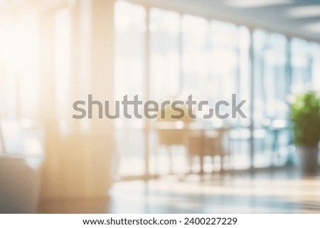 blurred spacious open office environment, abstract effect that highlights the play of light and bokeh in the background. 