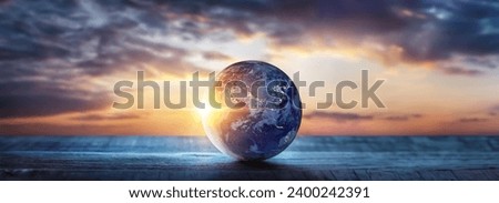 Planet Earth on the background of blurred lights of the city. Concept on business, politics, ecology and media. Earth day abstract background. Elements of this image furnished by NASA