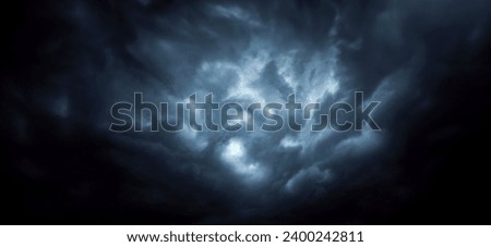 Dramatic sky with storm clouds before rain. Panoramic view of the stormy sky and dark clouds.  Concept on the theme of weather, natural disasters, typhoon.