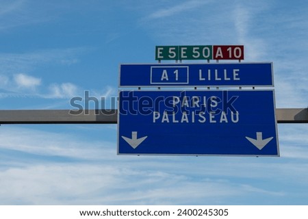 Highway road signs Paris, driving in heavy traffic on ring road of capital of France, traffic jam problems in Paris