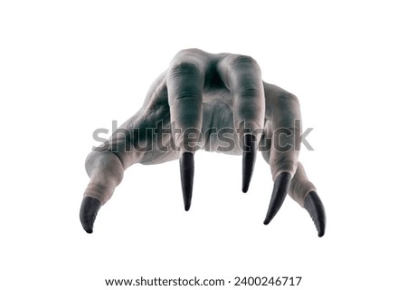 Creepy monster hand with black claws isolated on white background with clipping path Royalty-Free Stock Photo #2400246717