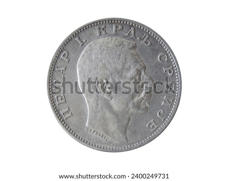 Obverse of Serbia coin 2 dinara 1912 with portrait of king Petar 1, isolated in white background. Close up view.