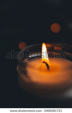 Burning beautiful candle background, close-up.