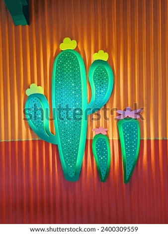 3D wall decoration with a unique light-up cactus shape. The striking colors give a cheerful and relaxed impression