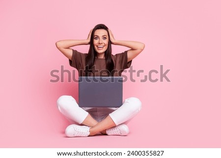 Photo of young touch head amazed working freelance first day take customer payment with good income isolated on pink color background