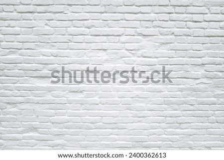 Photo background of white brick wall. Old grunge white painted brick wall texture background. Loft style wall. White brick Industrial abstract backdrop for photos, fabrics, textiles, papers