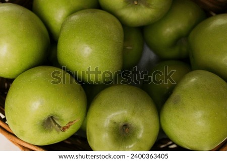 green apple in a basket
