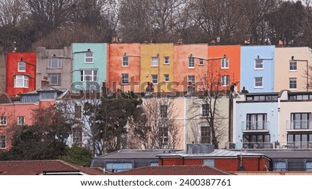 Colorful terraced housing overlooking the Bristol harborside in winter UK Royalty-Free Stock Photo #2400387761