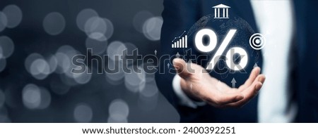 Businessman touching percent symbol with arrows 
